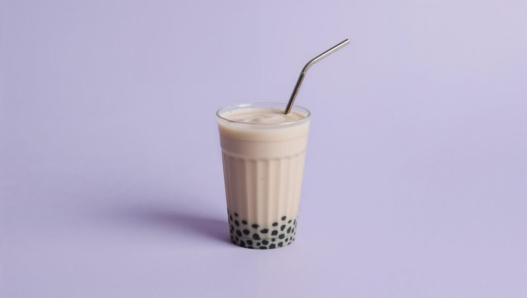Taro milk tea on pale lavender backdrop with minimal high-end styling