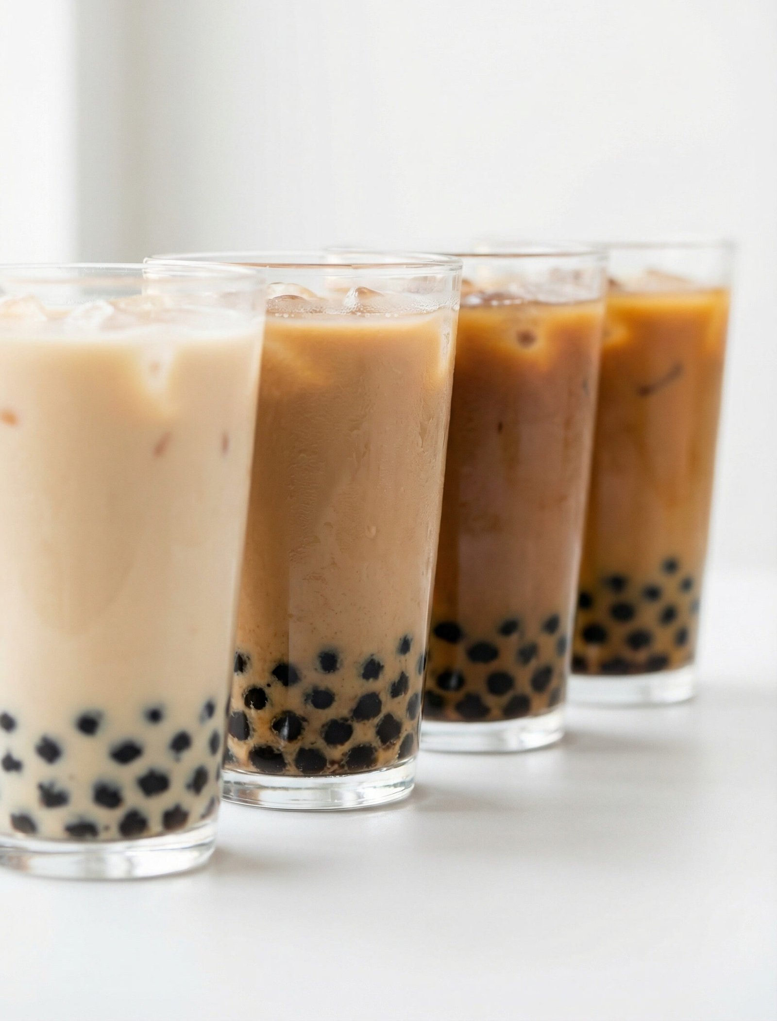 Milk tea color comparison showing how sugar level changes appearance