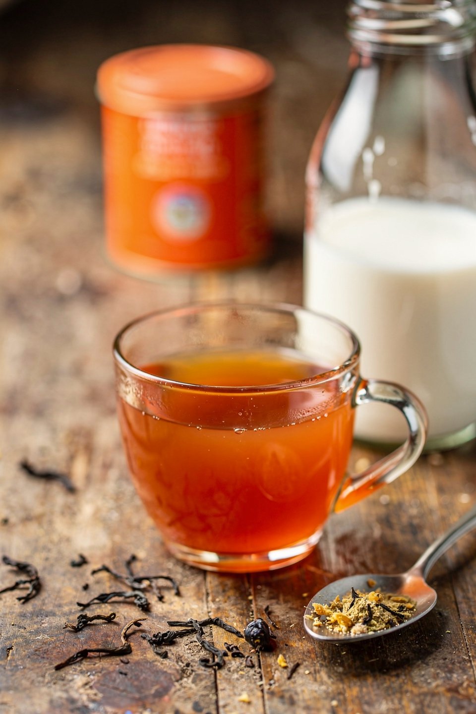 freshly brewed Thai tea in a glass cup for homemade Thai milk tea